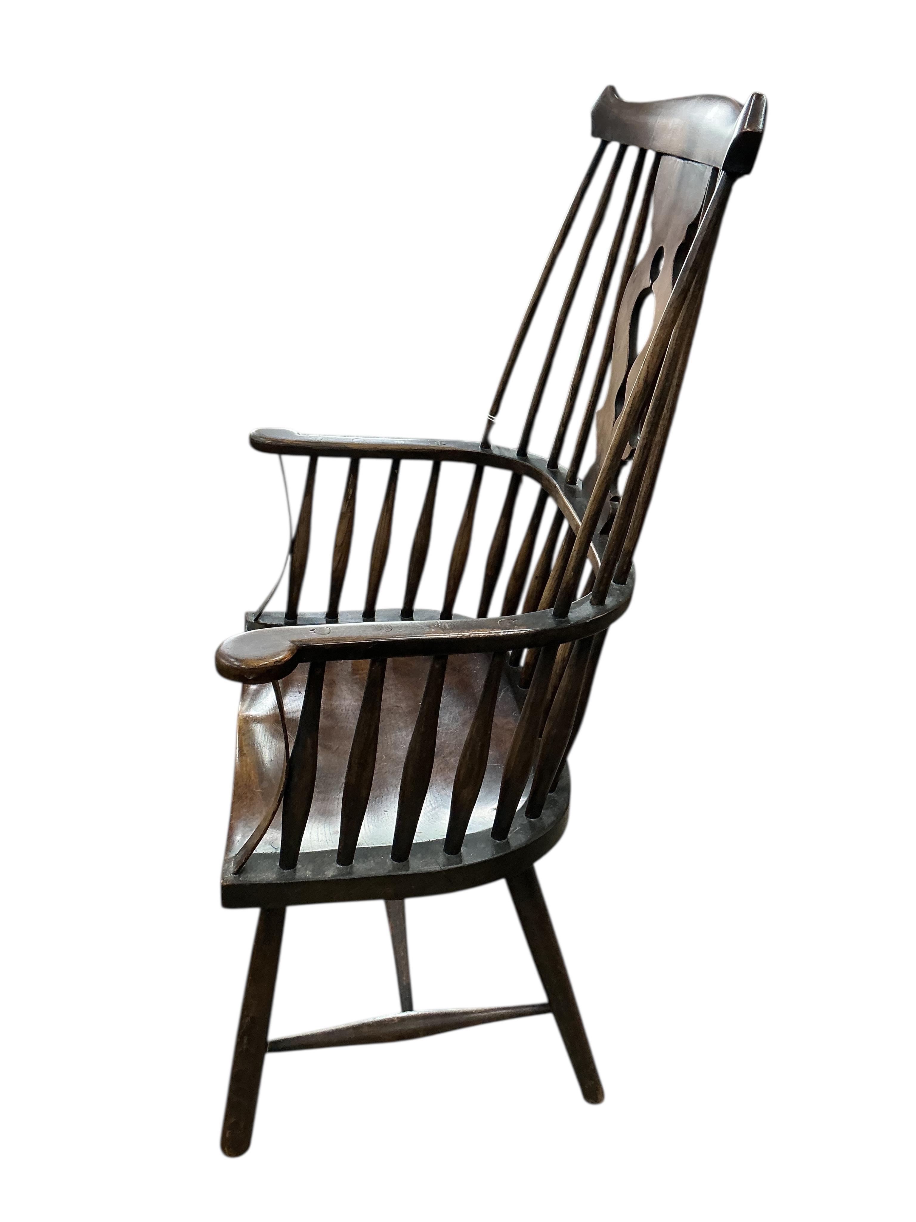 An early 20th century elm and beech Windsor armchair, width 66cm, depth 41cm, height 117cm